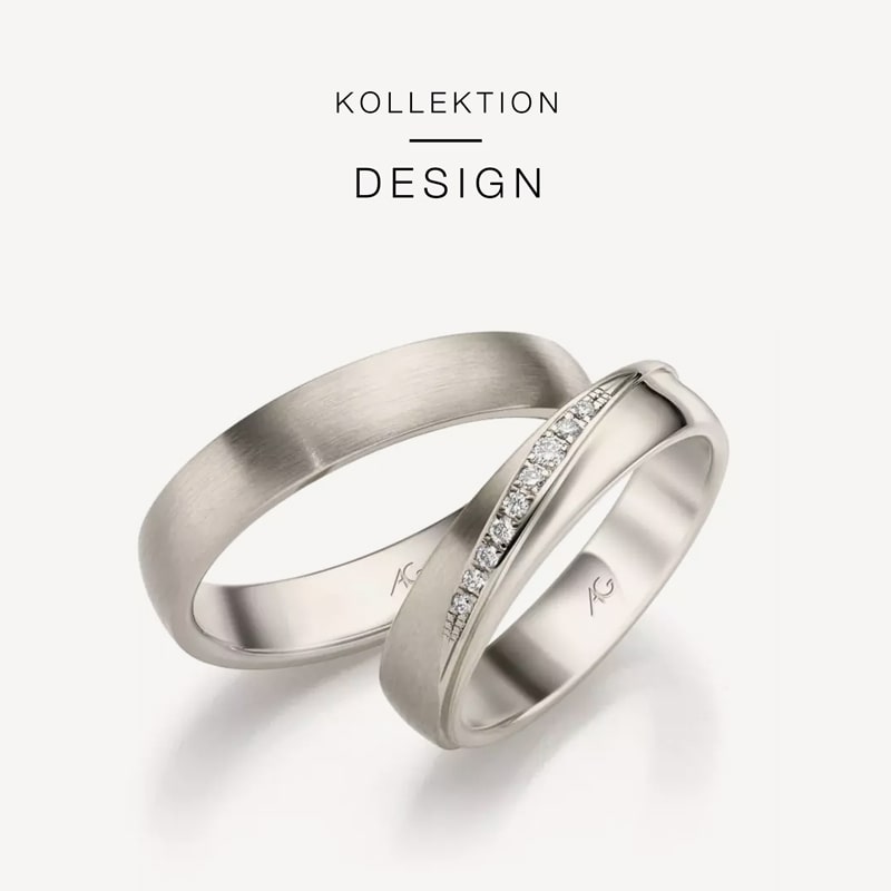 Juwelier-Morawitz-Gerstner-Kollektion-Design Zwei silberne Eheringe aus der Kollektion „Design“ von Juwelier Morawitz. Der vordere Ring ist mit kleinen, in einer Linie angeordneten Diamanten verziert, während der hintere Ring mattiert ist. Beide in Düsseldorf gefertigten Ringe sind auf weißem Untergrund platziert und mit einem kleinen Logo auf der Innenseite versehen.