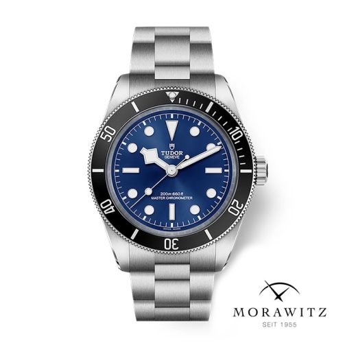 Abgebildet ist eine TUDOR BLACK BAY 68 Taucheruhr mit silbernem Gehäuse, blauem Zifferblatt, weißen Indexen und schwarzer Lünette. Das Morawitz-Logo und "SEIT 1955" befinden sich unten rechts. Die Uhr zeigt die Zeit 10:10 an.